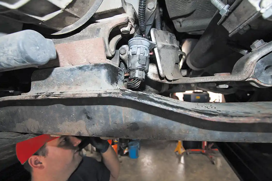 16. After routing the Banks Transmission Intercepting Cable down to the back of the transmission, plug the connector inline and safely mount the harness out of harm’s way.
