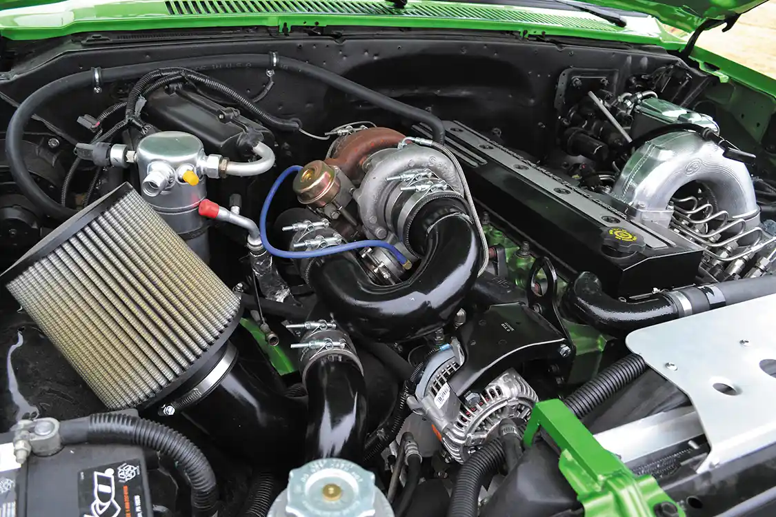 Bennett's C30 looks like it was made for the 5.9L <a href="https://www.cummins.com/">Cummins</a> engine. Bennett made his own modular motor mounts for the swap, which can be used to put a Cummins, <a href="https://www.dmaxengines.com/">Duramax</a> or LS engine in GM truck frames.