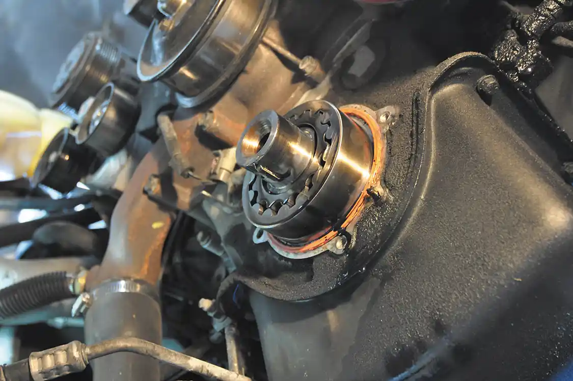 6. The pump cover is held on with four bolts: Once removed, the cover simply slides off leaving the inner and outer portions of the gear pump LPOP.