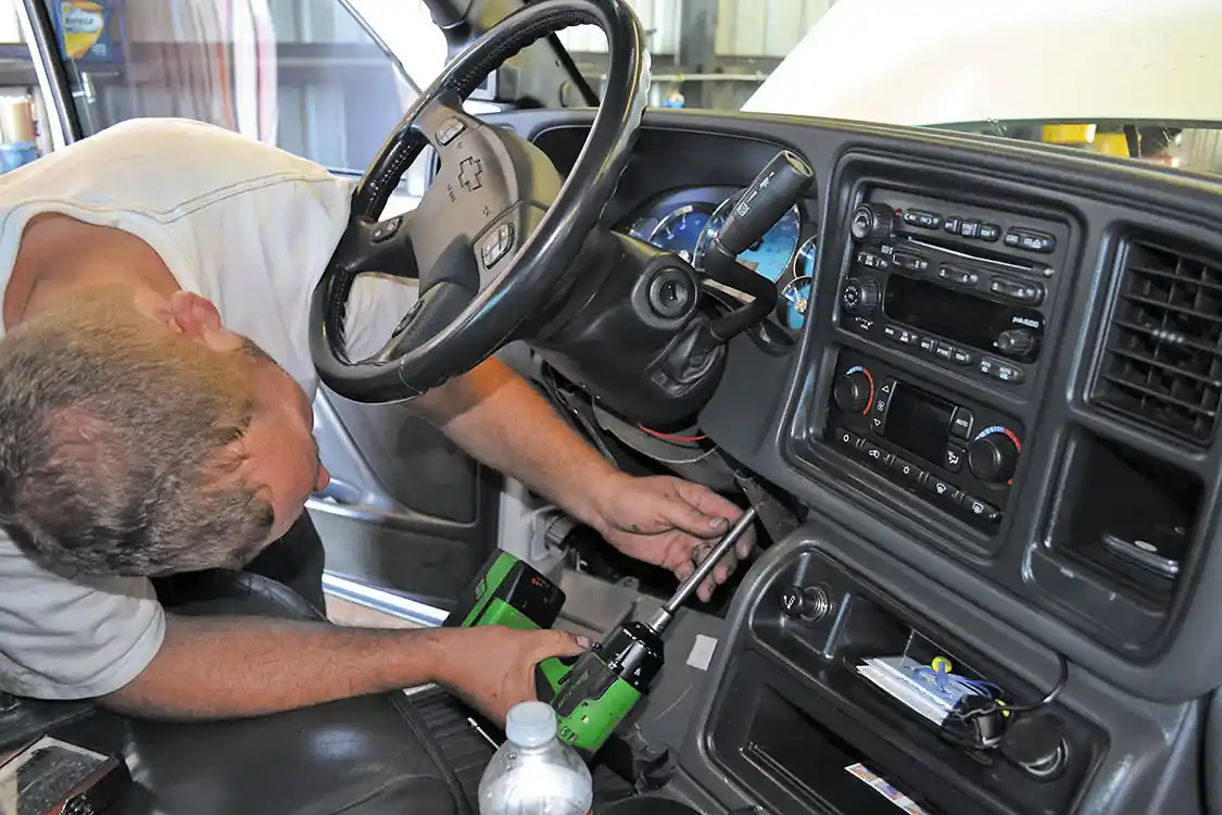 1. The first step of the install involved disconnecting the vehicle's batteries, negative sides first, then moving inside and removing the snap-in trim around the instrument cluster, plus the cover down by the knee bolster.