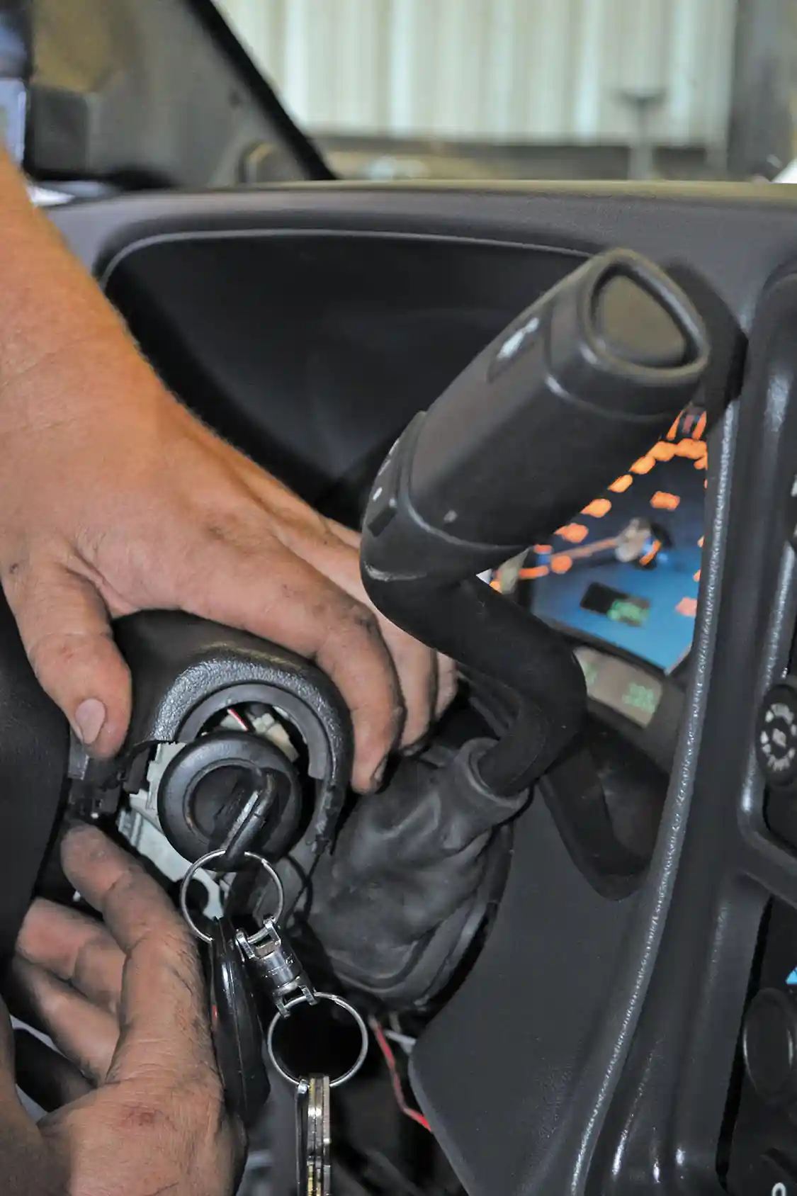 6. After the new shifter is installed, the steering column cover is snapped back into place. We were careful not to catch or pinch the rubber shifter boot on anything at this point in the install.