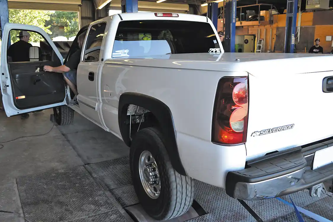 11. With the new TapShifter in place, owner Brian Peterson can now select the gear he wants for towing, passing, or in this case, dyno testing the truck. Holding the truck in one gear allows the driver to build boost and results in some slightly better power numbers than the truck previously put down.