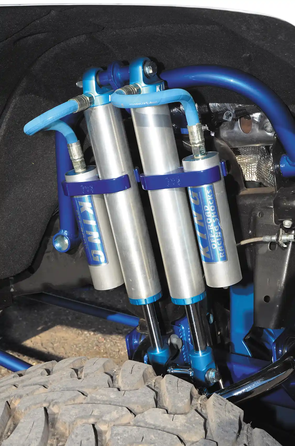 The remote reservoir <a href="http://www.kingshocks.com/category/king-products/performance/">King</a> 2.5 performance shocks on the front of this rig will help dampen any road it encounters—paved or not.