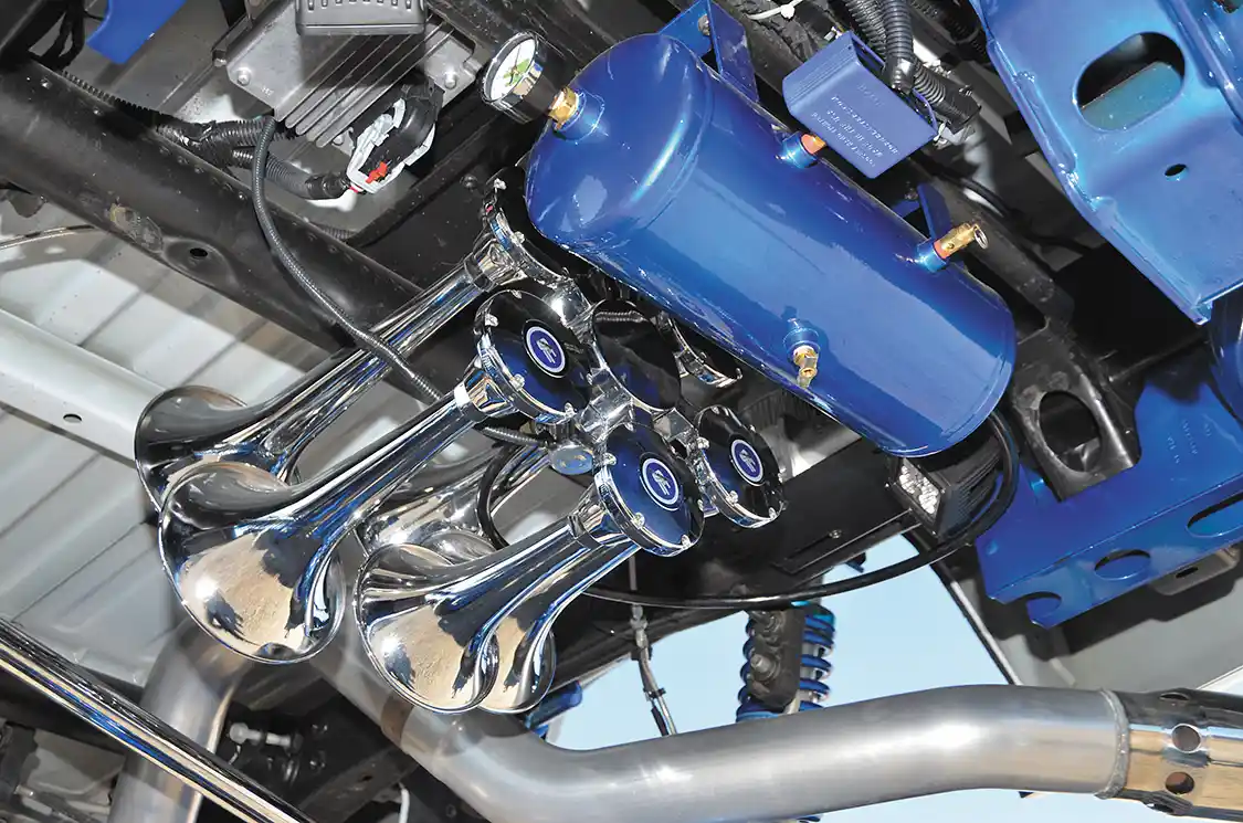 The chrome Admiral 540 Train Horn Kit from Horn Blasters, with air tank and VIAIR compressor to charge the system.