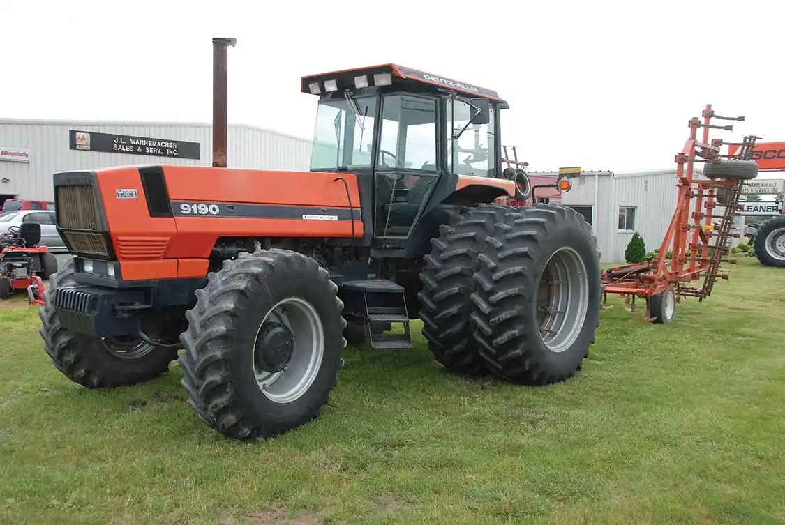 With a 119-inch wheelbase, the 9120 is a long tractor. That was a good thing from the weight balance and ride comfort standpoints, but made for a wide turning circle. This tractor weights more than nine tons before weight are added. It came standard with AWD and an 18-speed partial power shift transmission. This one has already lived a life of hard work but is not done yet. The rear dual radial tires make this a tractor that’s still up to long days in the field with big implements and tough ground. It’s seen here on <a href="https://www.agcocorp.com/">AGCO</a> Dealer J.L. Wannamacher’s lot in Ottoville, Ohio.