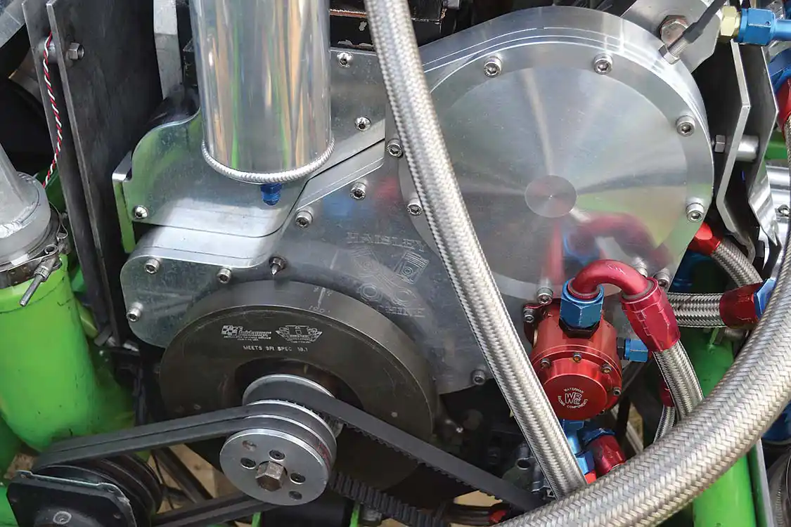 Since the engine's dimensions are different than stock, a custom front cover from <a href="https://haisleymachine.com/">Haisley Machine</a> is also used. Also up front is a <a href="https://fluidampr.com/">Fluidampr</a> harmonic balancer that helps control 6,000-rpm harmonics, and a 700-gph Waterman lift pump that’s driven off a gear inside the front gear train.