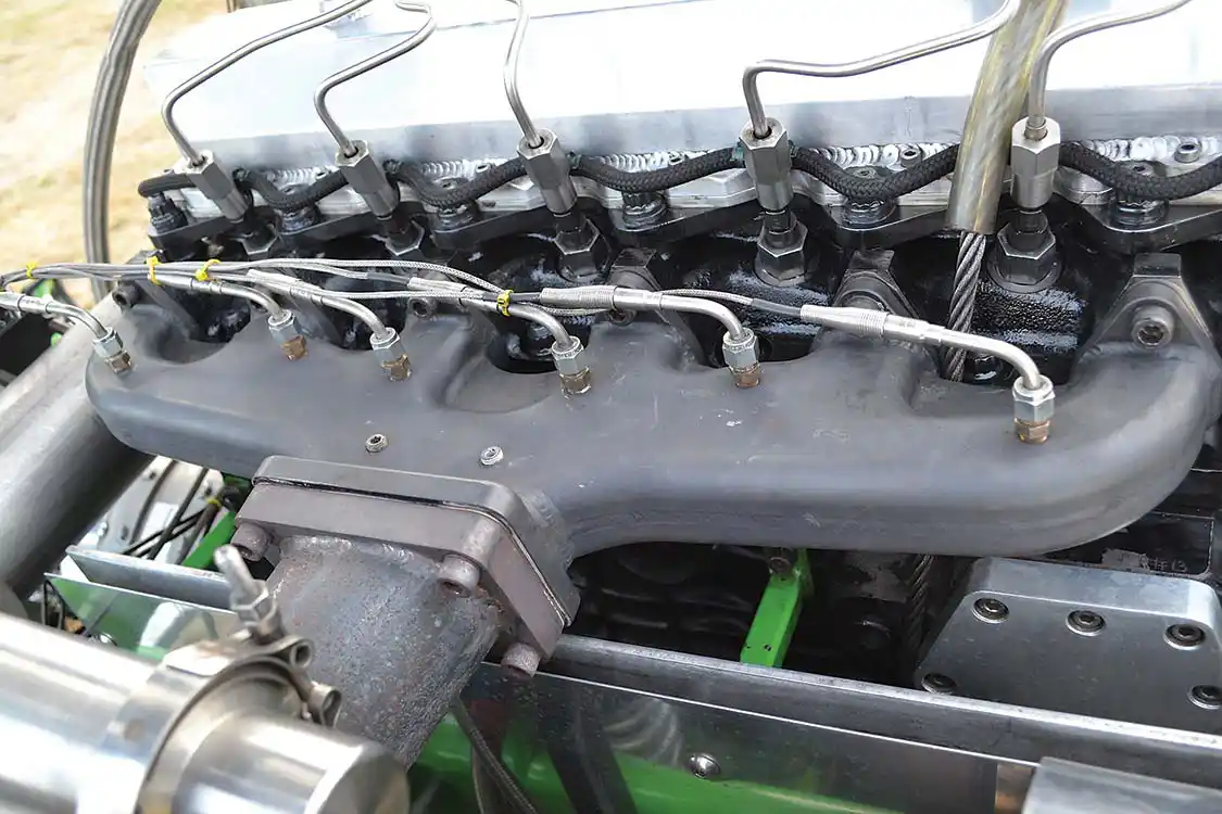 On the exhaust side of the near-3,000-hp engine is a <a href="https://steedspeed.com/">Steed Speed</a> exhaust manifold, which has shown to be reliable, and also produce more power. Notice that the truck's data logging system also monitors exhaust gas temperatures for each individual cylinder, rather than just having one probe.