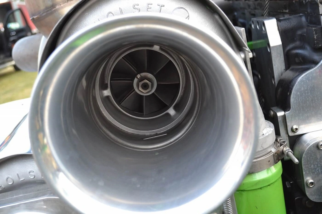 The velocity stacks in front of the turbos smooth incoming air, but they also act as air shutoffs in case of an accidental runaway situation. A flat plate in front of the turbos slides shut, and without any air, the engine can't run.