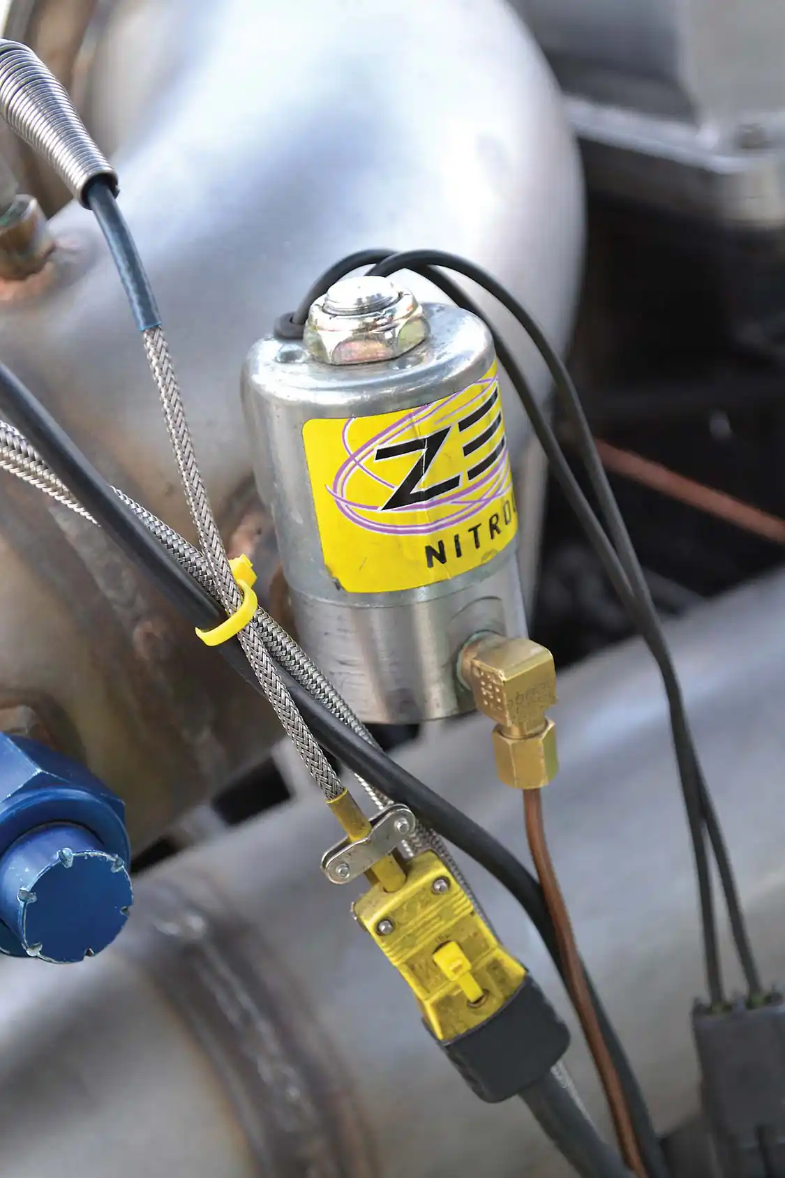 Nitrous is a big "no-no" in sled pulling, so we were surprised to see a <a href="https://www.zex.com/">ZEX</a> solenoid on the engine. Turns out Matt has a sense of humor, and he actually has it connected to an ether canister, so he can fire up the 12:1 compression Cummins without assistance.