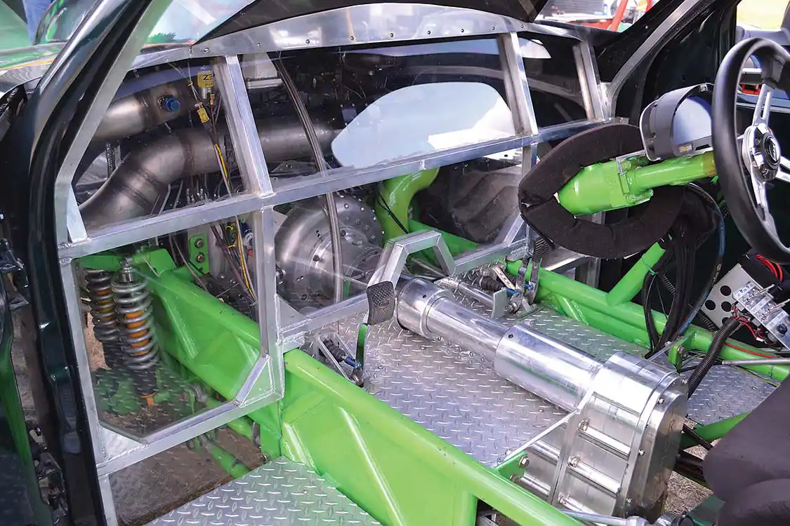 The GTS fiberglass body is a tilt design, and features a reinforced Lexan firewall for safety, and so Matt can see what's going on as he goes down track.