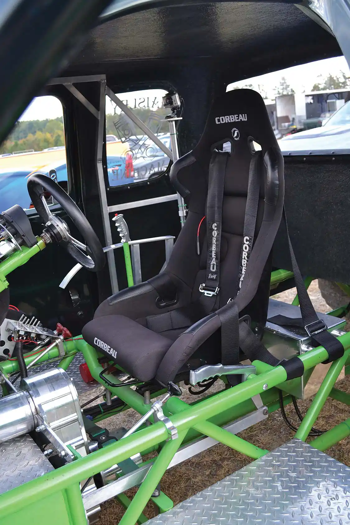 The "hot seat" in Alter Ego is where Matt controls the beast when pulling. A <a href="https://corbeau.com/">Corbeau</a> racing seat provides support on rough tracks while Matt hangs on. The large lever on the right of the seat is a hand throttle, which is used for precise control of engine rpm when pulling.