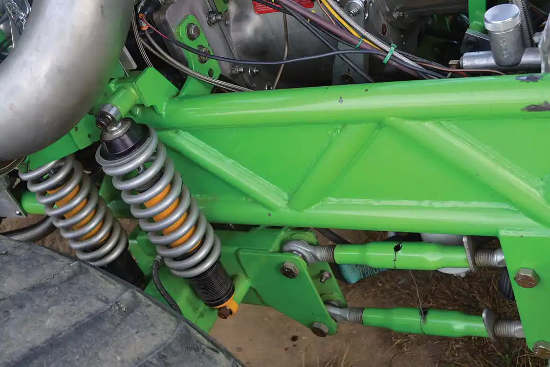The frame of the truck was built in-house by AEDM and reinforced with steel around the engine to prevent flexing. The four-link front suspension was also built by AEDM, and features <a href="https://eibach.com/us/">Eibach</a> shocks and <a href="https://www.koni-na.com/en-US/NorthAmerica/Home/">Koni</a> coilovers to allow the front end to move around while staying planted. A New Performance Pro 3-inch steering cylinder rounds out the front end.
