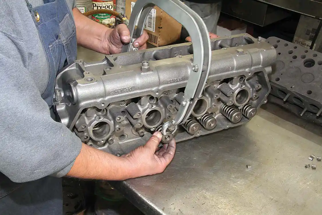 9. Once the valves are in place, the valve springs and retainers are installed and the heads are then ready to be bolted to the block. Refurbishing heads on lower mile motors is sometimes done, while leaving the bottom end of the motor alone.
