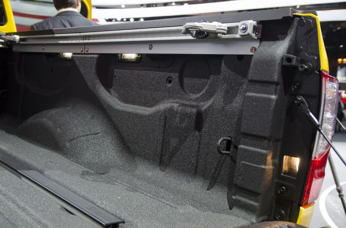 Looking for the in-bed storage boxes? So were we. Never found them. We hope they live up to the promise of ease of removal. But we do see the useful LED bed lighting and the equally useful tailgate lamps.