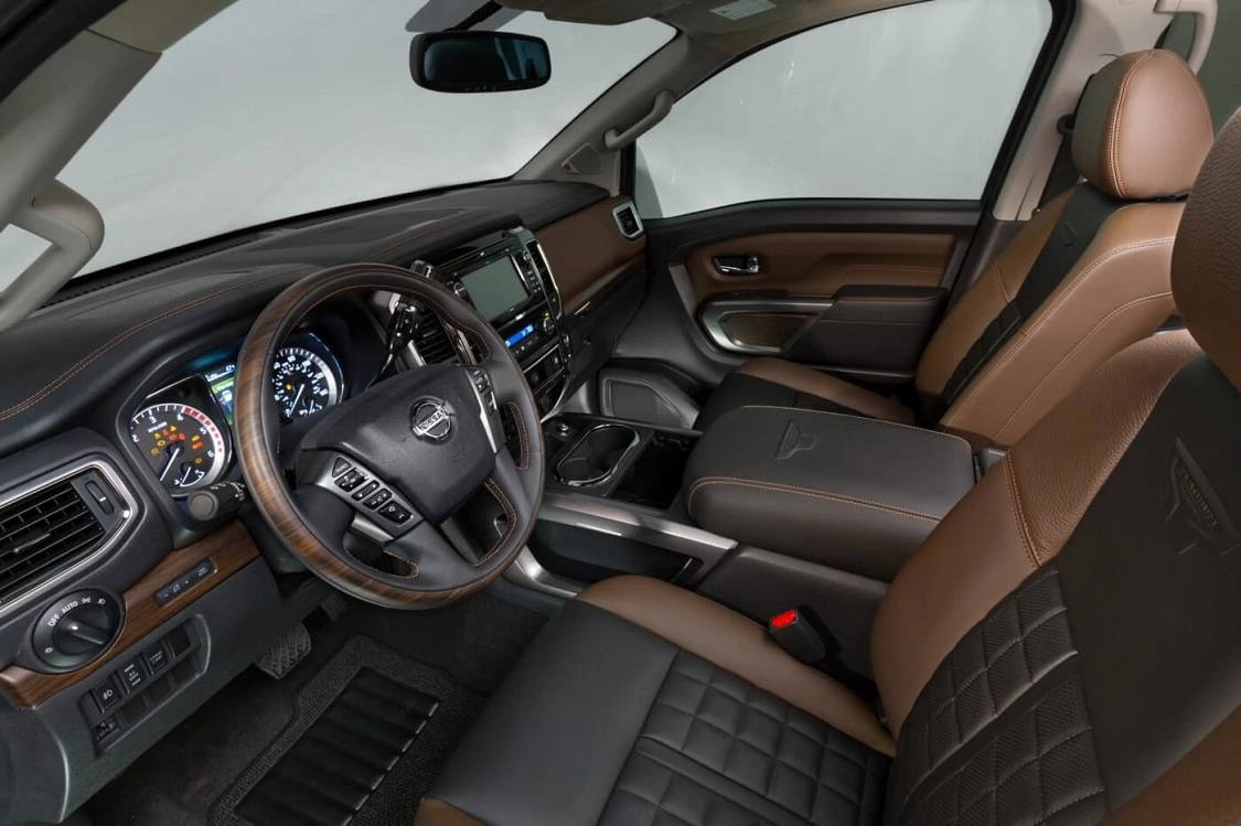 Every one of the three Platinum Editions we’ve seen has been luxurious without the ostentation of saddle leather, not that there’s anything wrong with it. However, Titan’s use of textures and stitching, for instance here in two shades of brown with red stitched accents, is masculine without being macho.