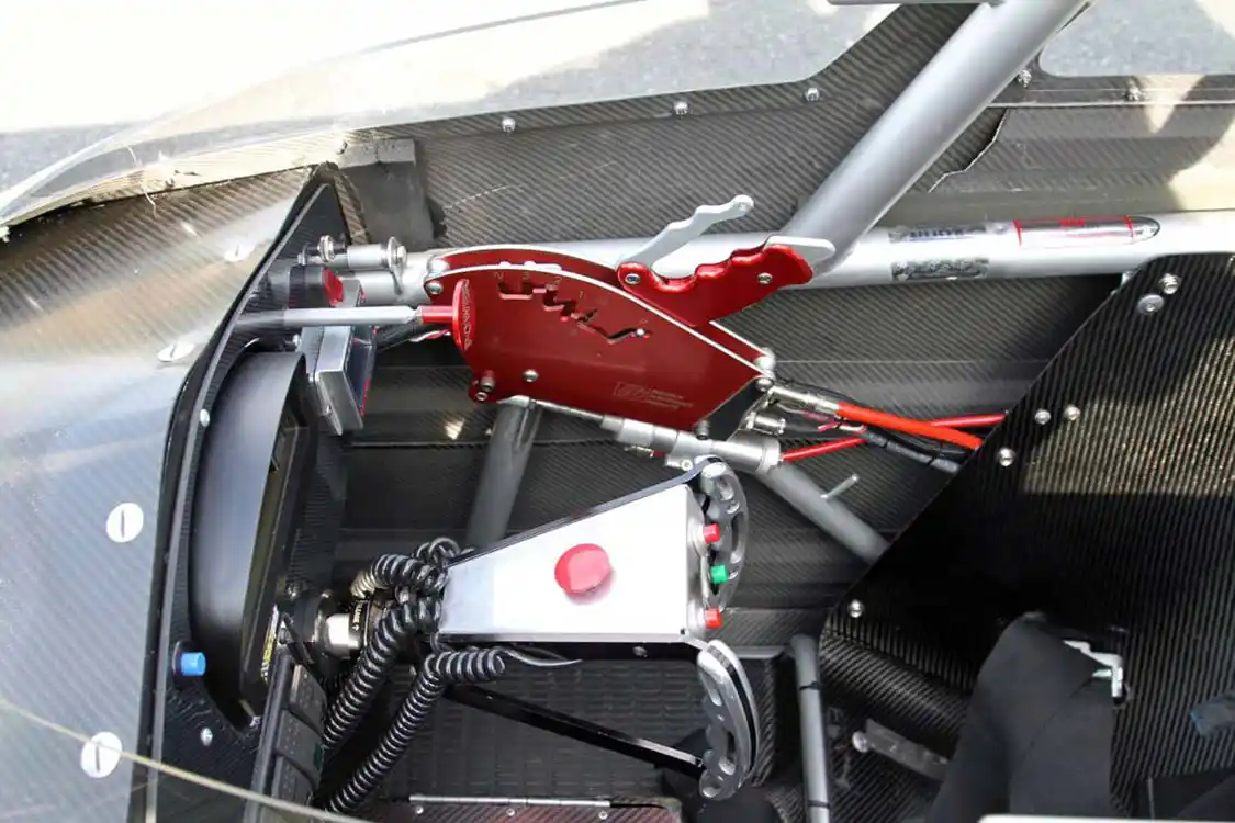 The buttons on the steering wheel allow Moody to set the transbrake, bump into the staging lights and shift the transmission without taking his hands off the wheel. He hits the big red button to deploy the parachutes at the end of a run.
