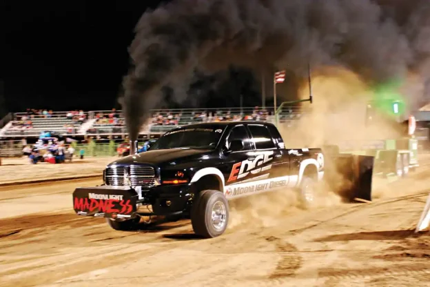 Edge Products sponsored driver Ryan Thain had his 5.9L Cummins ready to compete with the big boys in the Pro-Mod Diesel class where there are no restrictions for turbo size and cut pulling tires are allowed. Making well over 1,200 hp, he stayed right in there, landing a second place spot at 285 ft.