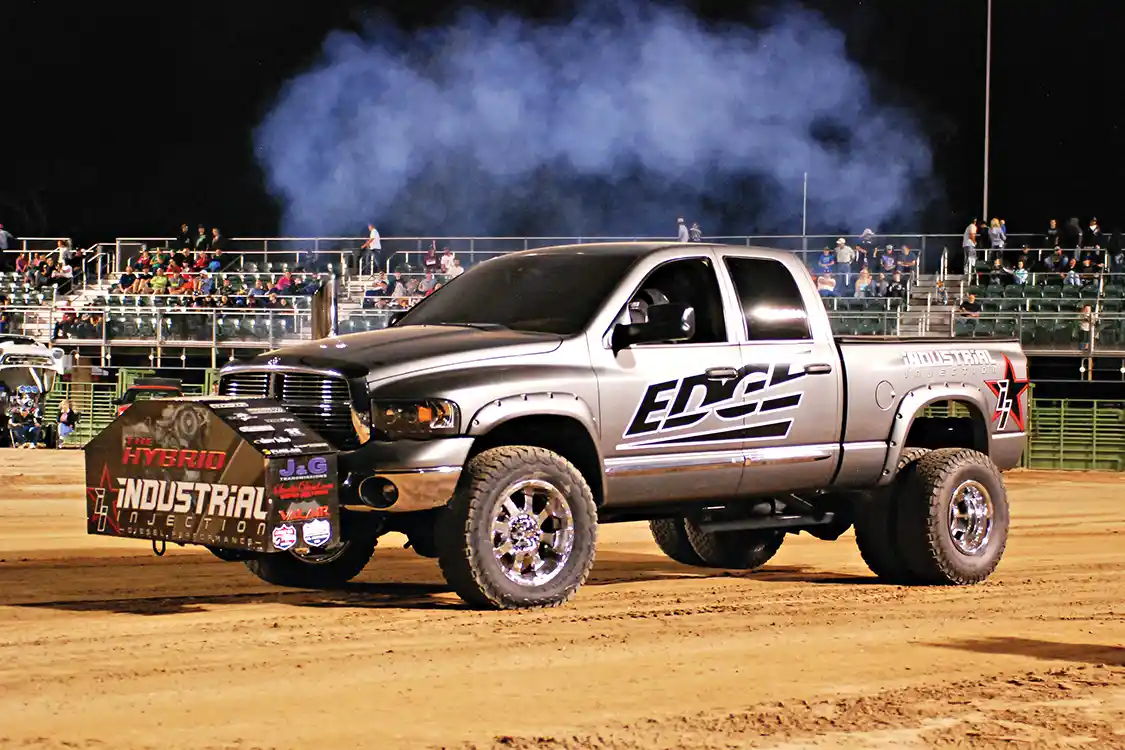 Tom Hansen has been running his 5.9L Common Rail Cummins in the 3.0 Inducer class for three straight seasons now. With Edge Products and <a href="https://www.industrialinjection.com/">Industrial Injection</a> as his main sponsors, you can bet he’s a front runner week in and week out. Pulling down the track to 311.4 feet put him atop the leader board taking home a first place check for the night.
