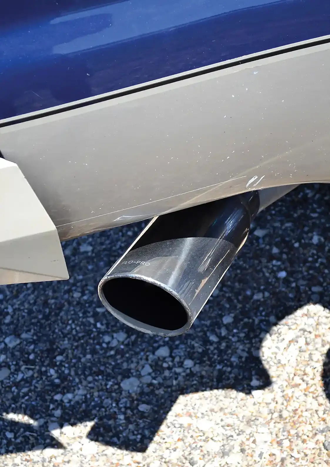 With a custom turbo kit, things like the 5-inch downpipe were custom built, but towards the rear, a normal off the shelf over-the-axle 5-inch MBRP kit could be used, which terminates into a chrome tip.