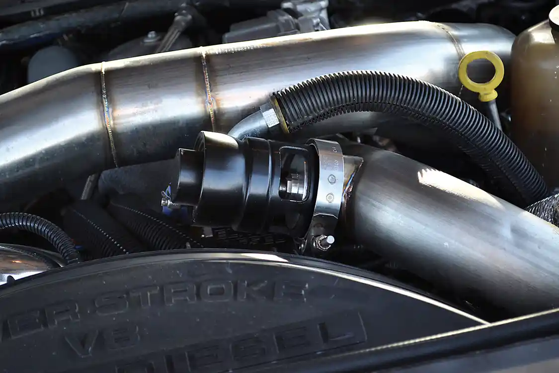 Chopping off the throttle quickly can create pressure spikes in the intake tract, so a blow-off valve was installed in the intake piping to keep compressor surge virtually nonexistent.
