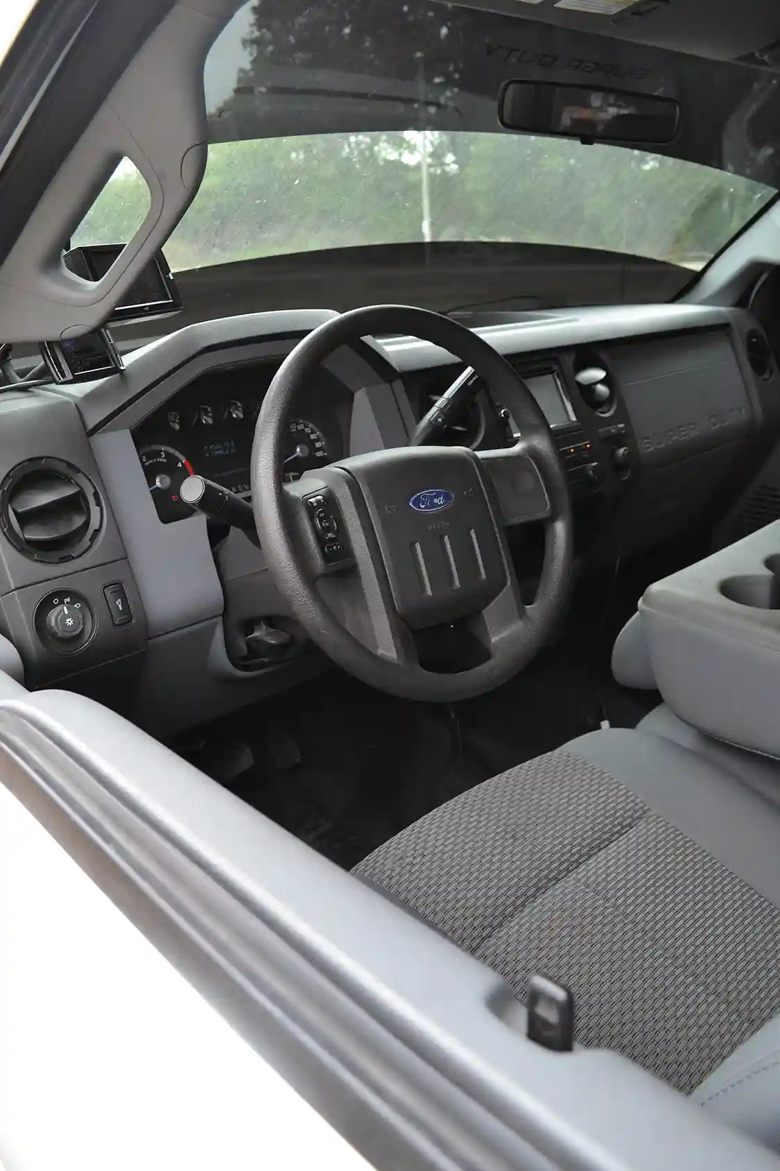 In contrast to the highly modified engine, the interior of Morgan's Ford is fairly stock, other than a couple of monitors.