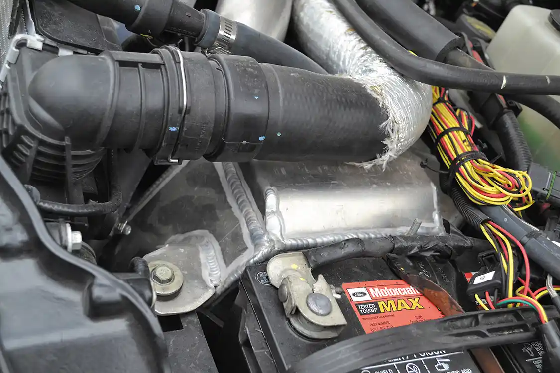In addition to the intake, <a href="http://www.nolimitfabrication.com/">No Limit Fabrication</a> also supplied an air-to-water intercooler, which flows 30 percent more than the factory version yet fits right where Ford originally intended.