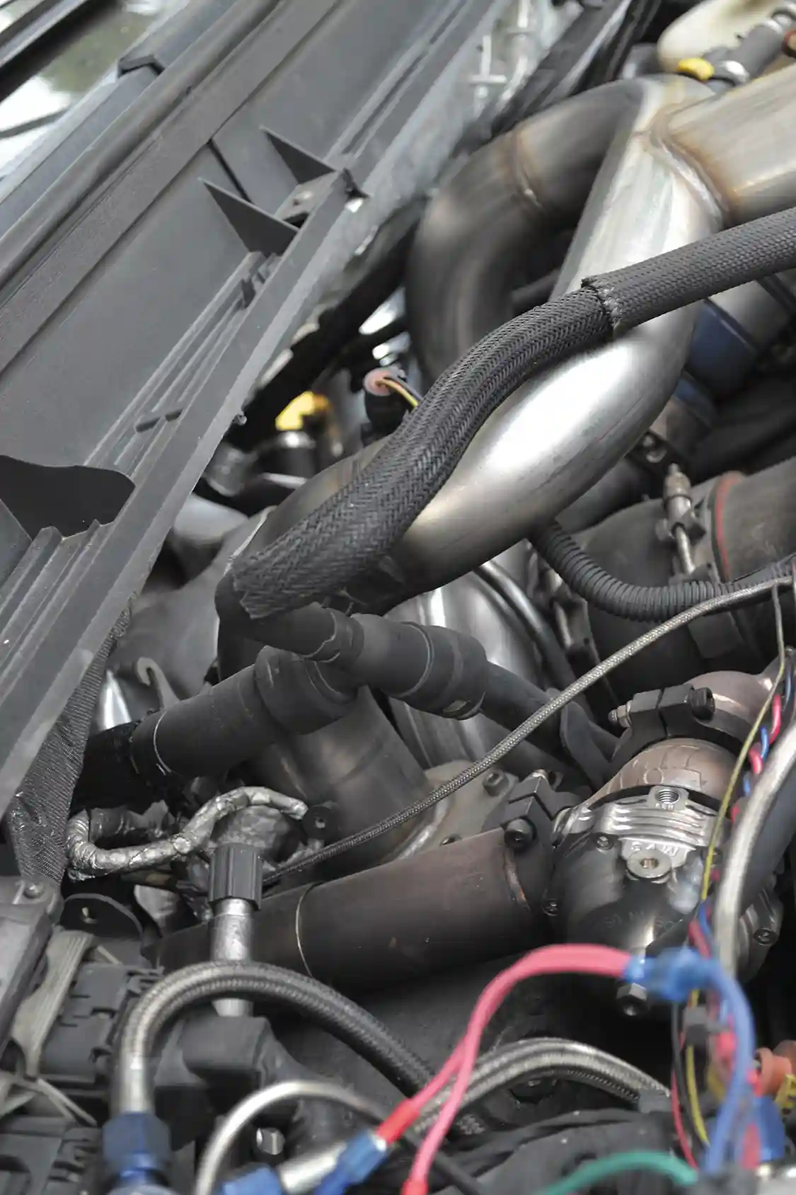 A lot of nitrous meant a waste gate had to be added, so Morgan fabbed up an up-pipe setup that incorporated a 44mm Tial gate. Even with the wastegate wide open, drive pressure is still a scary 90 psi when both stages are activated.