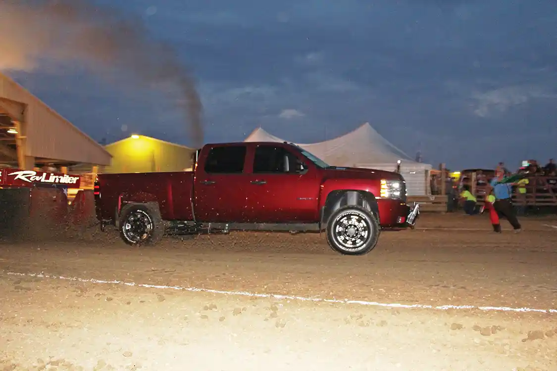 Digging his way to a Second Place spot in Work Stock was Kevin Westart’s ’09 <a href="https://www.chevrolet.com/">Chevy</a>. The stock-bottom end LMM under the hood sports a 68mm Cheetah turbo, 10mm stroker CP3, and 60-percent over injectors dyno’d out at 700-rwhp. Unfortunately, a broken rear ring and pinion ended his pursuit of First Place finisher Josh Davis and his 6.4L powered dually.