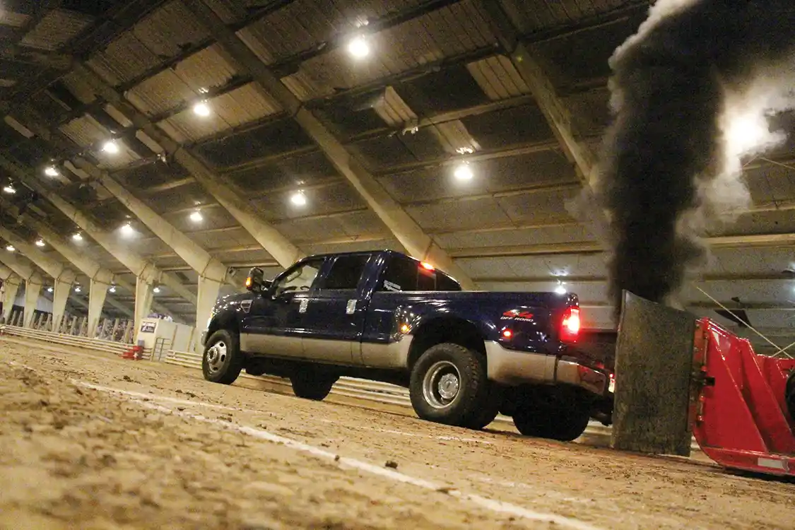 This ’08 F-350 is owned by Sean Christy, and it’s always a top finisher in central Illinois area work stock classes. It’s also common to see Sean signed up to run in every class that will allow him to hook! This night would see the 6.4L powered Ford finish Third in Work Stock, Fourth in Hot Street, and Third in the Open Class.