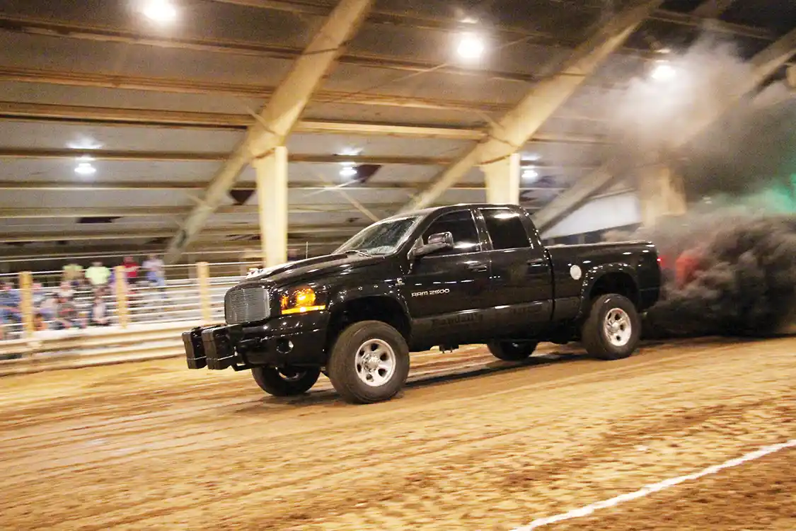 With some serious mph built up by mid-track, Brian Randall led the field in the Hot Street class with a 344-foot pull. His ’06 Dodge sports three turbos, two 12mm CP3’s, 250 percent over injectors, and is driven on the street. It’s a textbook example of what the Hot Street class is all about: a class that provides high horsepower, street-legal, unlimited turbo trucks a category to compete in.