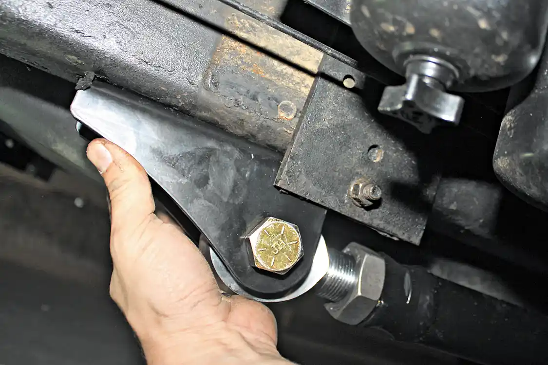10. On the frame end of the bars, the frame bracket can be attached to the rod end with the supplied 3/4" bolt and then held up against the frame rail so the furthest forward mounting hole can be marked on the bottom of the frame.