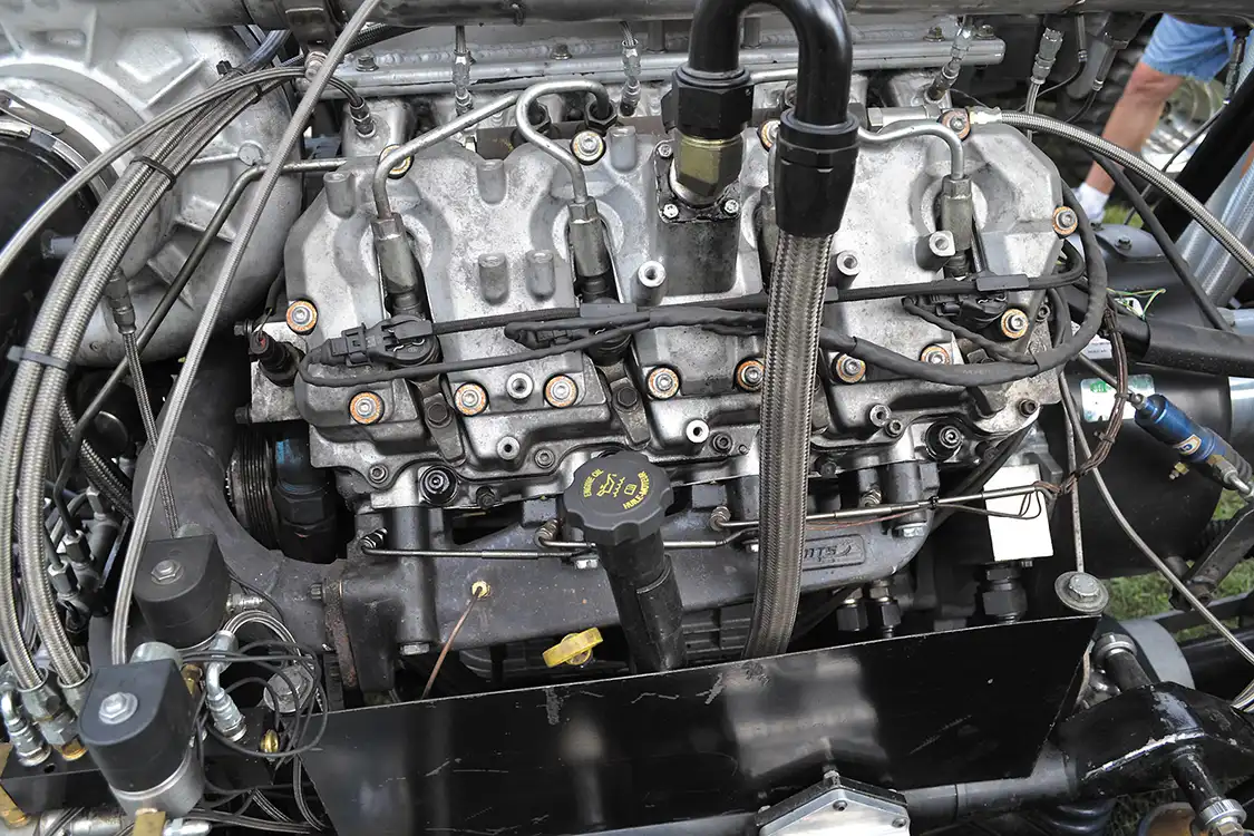 The long block in Kyle's rig is one of the stoutest Duramax engines we’ve ever seen. The block is from a 2011 LML, is filled, and equipped with <a href="https://arp-bolts.com/">ARP</a> main studs. The engine also has a one-off <a href="https://bryantracing.com/">Sonny Bryant</a> crank, <a href="https://www.cp-carrillo.com/">Carrillo</a> connecting rods, and 15:1 <a href="http://www.us.mahle.com/en/">Mahle</a> pistons. Surprisingly, the block and <a href="https://waglercompetition.com/">Wagler Racing</a> CNC cylinder heads are not fire-ringed, but do have custom 625 studs holding everything together along with an OEM head gasket. Exhaust manifolds are from <a href="https://www.atsdiesel.com/ats2/">ATS</a>, and the AFO cam is a custom grind from <a href="http://crankitupdiesel.com/index.htm">Crank It Up Diesel</a>. <a href="https://www.pushrods.net/">Smith Brothers</a> pushrods and Wagler Racing valve springs with factory rocker arms round out the long block.