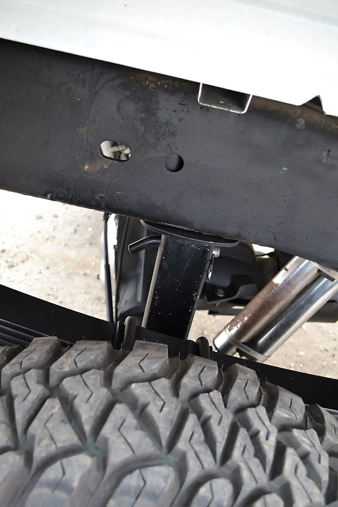The rear suspension uses a simple setup of re-arched leaf springs, <a href="https://www.ridefox.com/">Fox</a> shocks, and homemade bump-stops to keep the Chevrolet planted to the track.