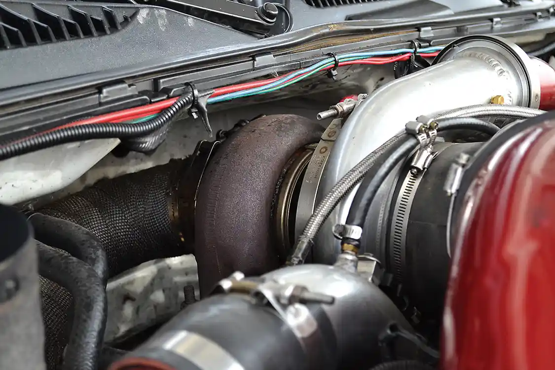 Truck's competing in the 3.0 Class can only have a 3.0-inch (76.2mm) turbocharger, so we were surprised to learn that John normally runs a 88mm S400-based charger, that's been configured for 3.0 Class rules.