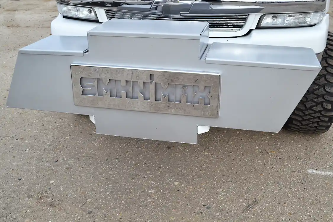 It's hard to miss the Chevy emblem weight box, but what you might not know, is that there's an intercooler in there. The water to air unit was fabricated up with the help of John's son, John Jr., and was mounted as far forward as possible for traction when hooked to the sled.