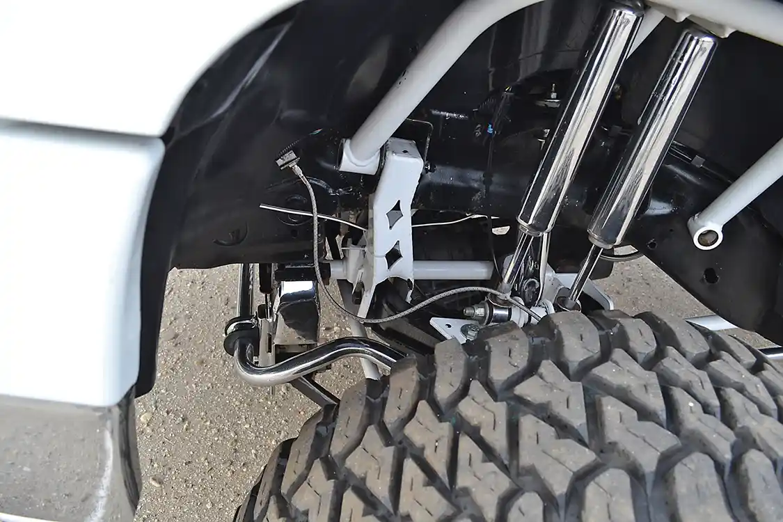 A <a href="http://ftskits.com/">Full Throttle Suspension</a> (FTS) lift kit raises the front end enough to clear the largest and widest of tires. Although the lift is originally designed for 10 inches, John runs it at 6 inches for better geometry. With minimal breakage over a 10-year period, he must be doing something right.
