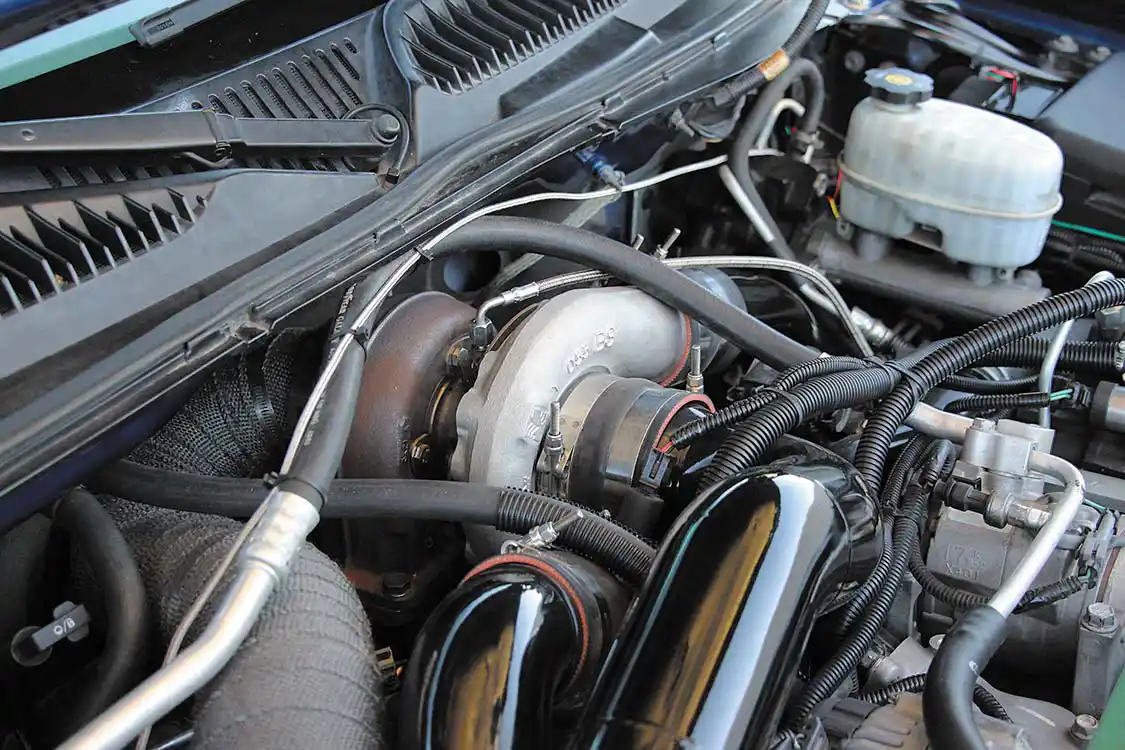 Opting for a compound turbo arrangement called for sizing a high-pressure turbo that could survive a fair amount of drive pressure yet flow well up top. The answer was this T4 flanged, billet S366. It’s built by <a href="http://engineered-diesel.com/">Engineered Diesel</a> and was included in the <a href="https://www.wcfab.com/">Wehrli Custom Fabrication</a> Big Twin kit Matt purchased.