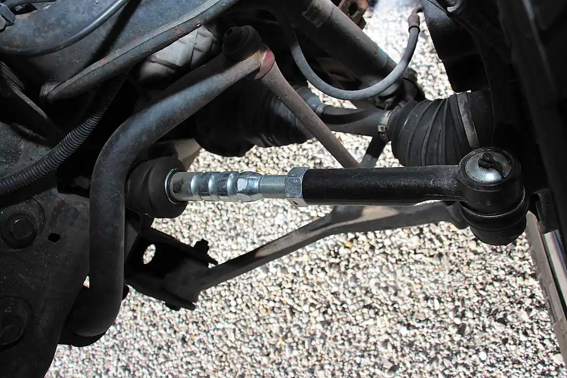 <a href="https://fabtechmotorsports.com/">Fabtech</a> HD tie rods replace the failure-prone factory units up front. The Fabtech units are nearly three times the size of the stockers.