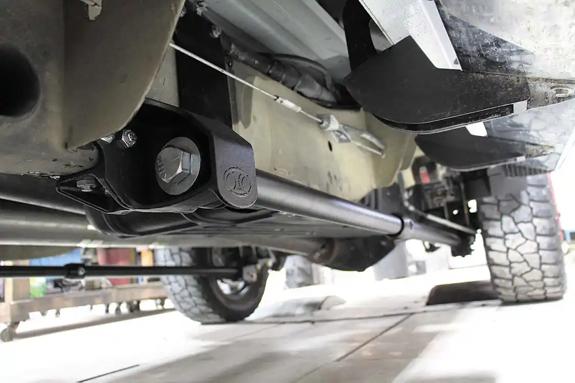 24. Doubling the power of any truck is all for naught if you can’t plant that power to the ground. So, along with the lift, a set of short-gusset traction bars from <a href="https://www.ouostore.com/">One Up Offroad</a> added some much-needed rear axle wrap control. On top of controlling axle wrap, these industry-leading traction bars allow driveline parts such as U-joints, driveshafts, and pinion yokes to survive life at 700+ horsepower.