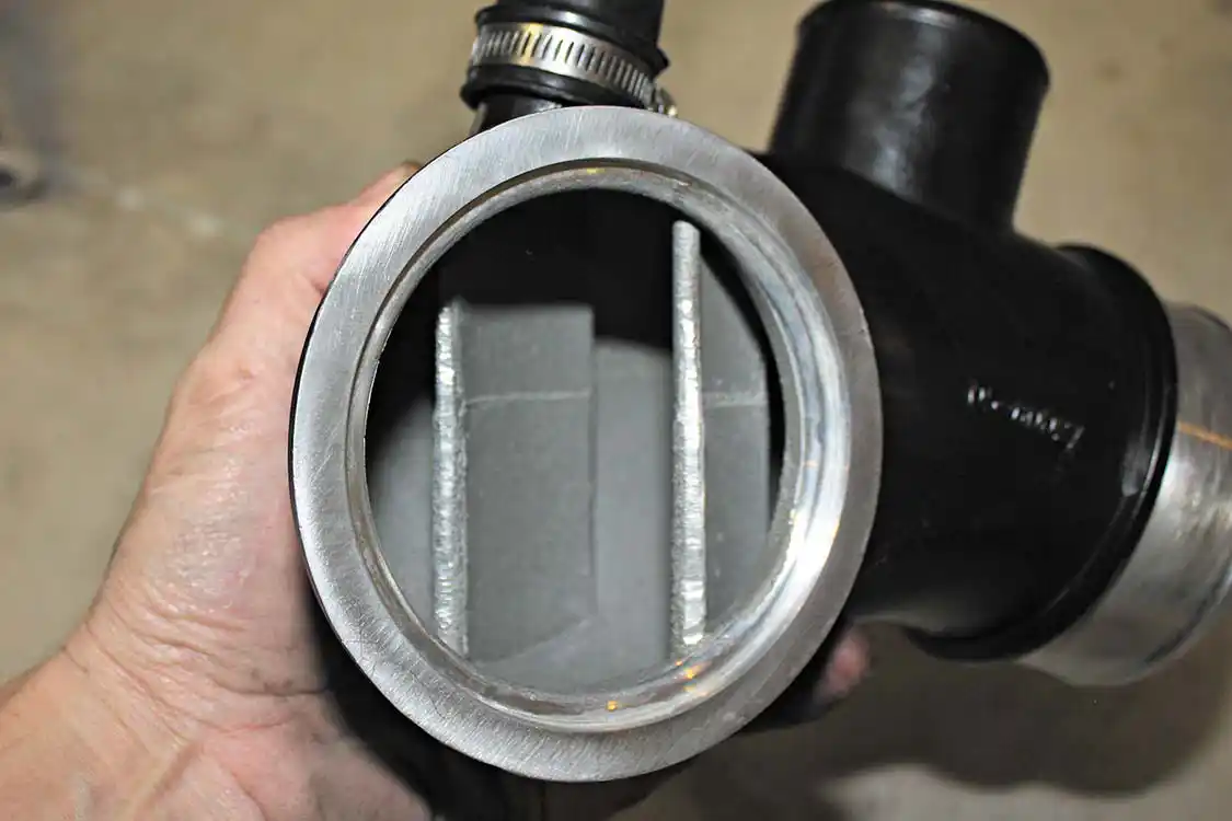5. Inside the cast, the aFe inlet manifold uses a patented multi-direction vane (MDV) technology that guides air to the turbocharger to increase spool-up and power. aFe’s dyno testing has shown a 9-hp and 23 ft-lb. torque improvement. Best of all, its CARB compliant.
