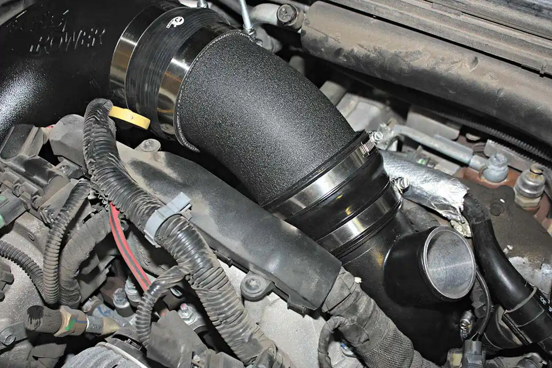 9. With the new Bladerunner inlet manifold installed, the Momentum HD intake will connect right to it using the supplied boots and hose clamps. The system fits together like the OEM unit would, but with the additional flow will produce better turbo spool-up, meaning you’ll get into the engines power band sooner, making for better acceleration and throttle response.