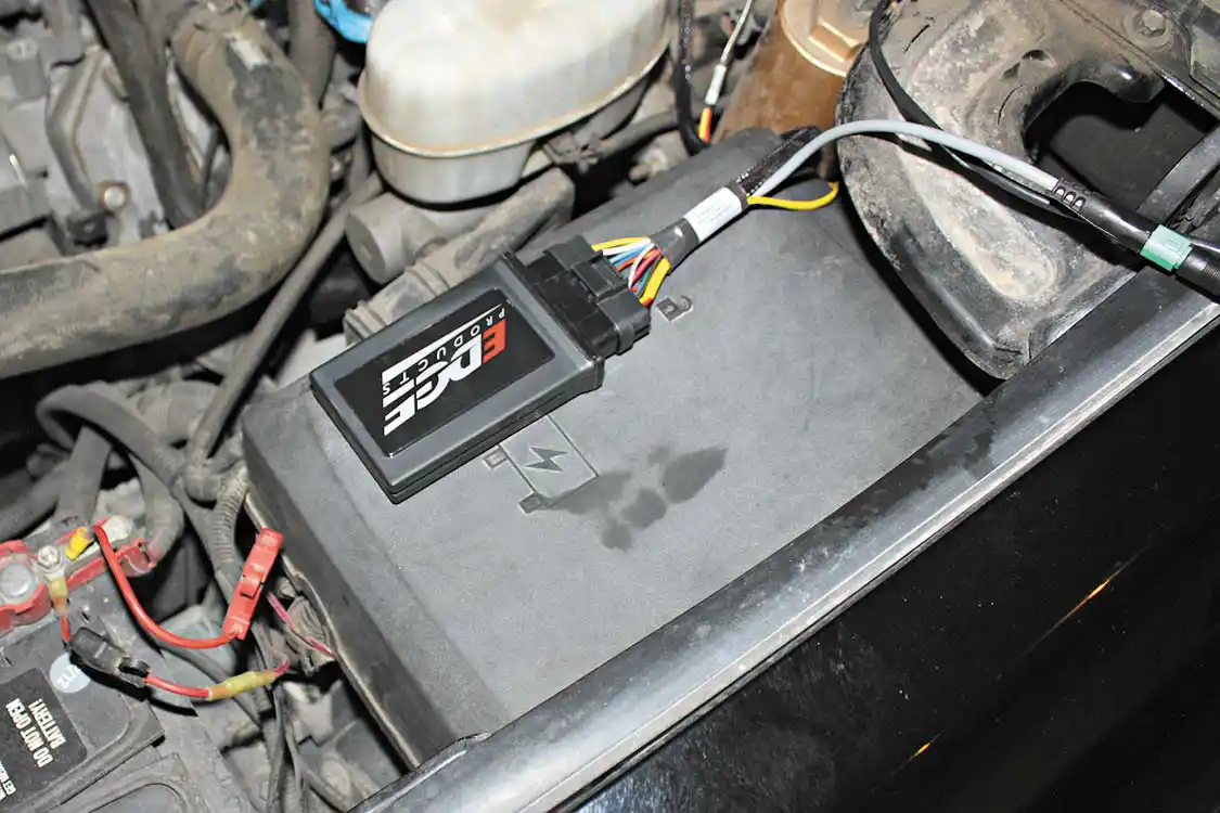 13. The Juice module is attached to the top of the fuse box, and just one main harness will be fed through the firewall into the CTS2 monitor that will be mounted from the windshield with the included mount. Because the system piggybacks into the stock wiring harnesses, not only do you get adjust on the fly tuning, but it can also offer power back down if EGT’s get too high, offer defuel on shifts and even monitor transmission-slip to keep the stock Allison transmission safe.
