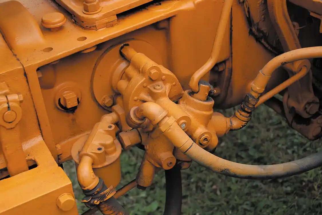 Sheppard had an optional hydraulic system, which was a premium feature in that era. The pump was a transmission-driven, 11 GPM unit and capable of up to 1000 psi. The bypass was adjustable to raise or lower the pressure as needed according to the application.