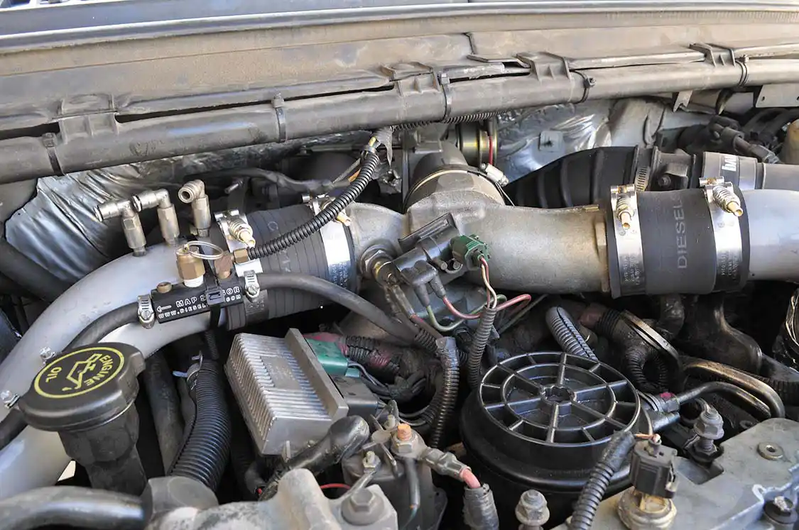 6. Removal of the stock charger requires removal of about a dozen parts and can be done with simple hand tools.