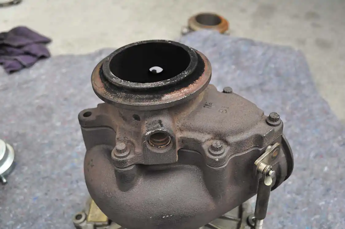 21. The OEM turbine outlet flange must be removed and reinstalled on the new BD Diesel turbo.