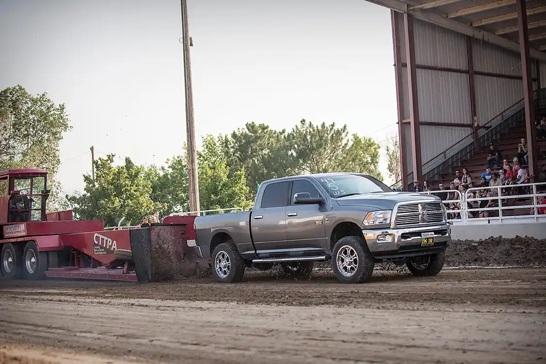 Joe Harrell’s 2012 6.7L Cummins took home the top spot in the Work Stock class with a 306-foot pull. The truck runs 90-hp injectors, a modified CP3 and a modified 64mm HE351VE turbocharger.