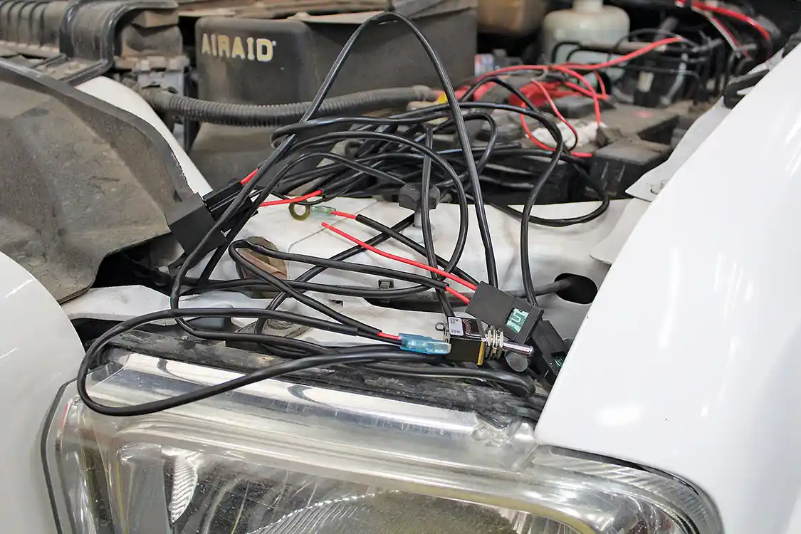 17. The Incredible RC1X grille includes a simple wiring harness to wire up the LED light bar. Though it looks a bit jumbled up here, installation was a simple matter of routing the wiring into the cab and hooking it up to a power source. Wiring installation took about 15 minutes.