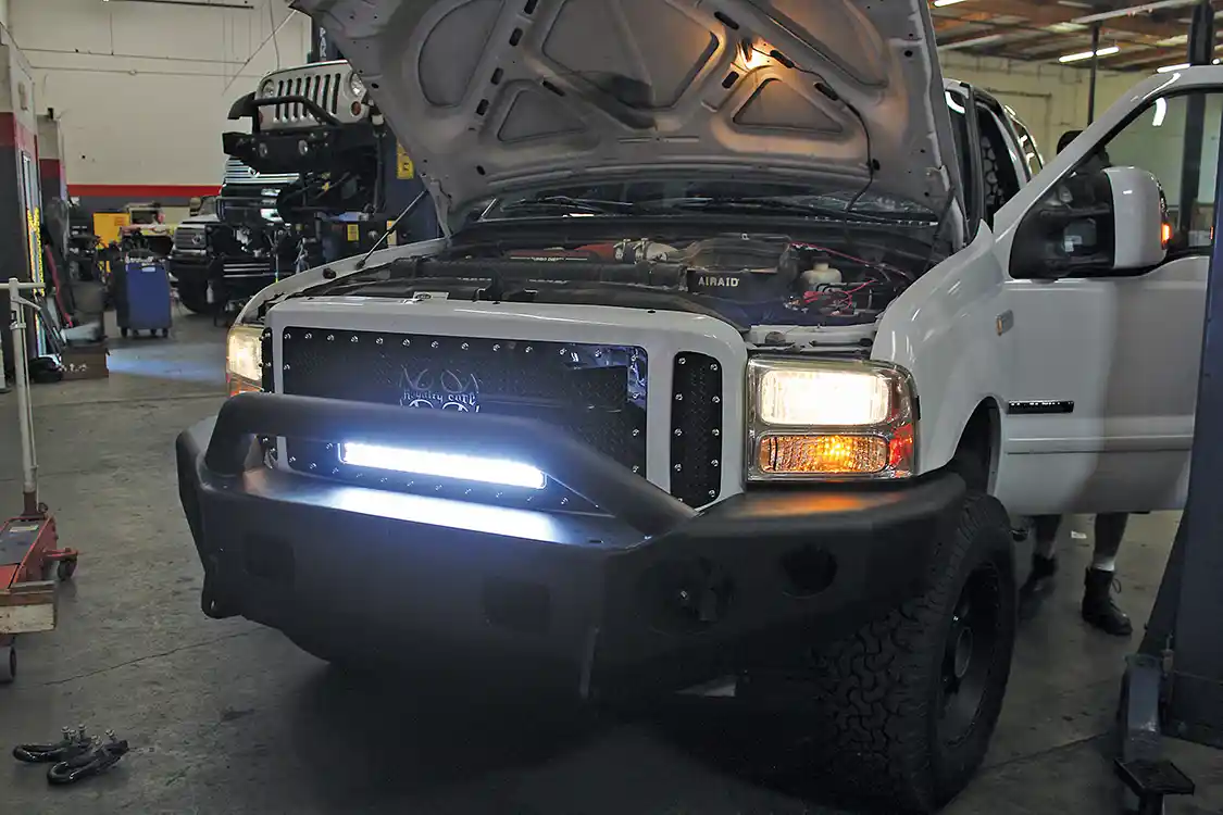 18. A quick check verifies that the Vision X light bar is working and also gives us a glimpse of what the truck will look like after dark with the light bar on. Our installation is wired so that the light bar can only be switched on with the headlights.