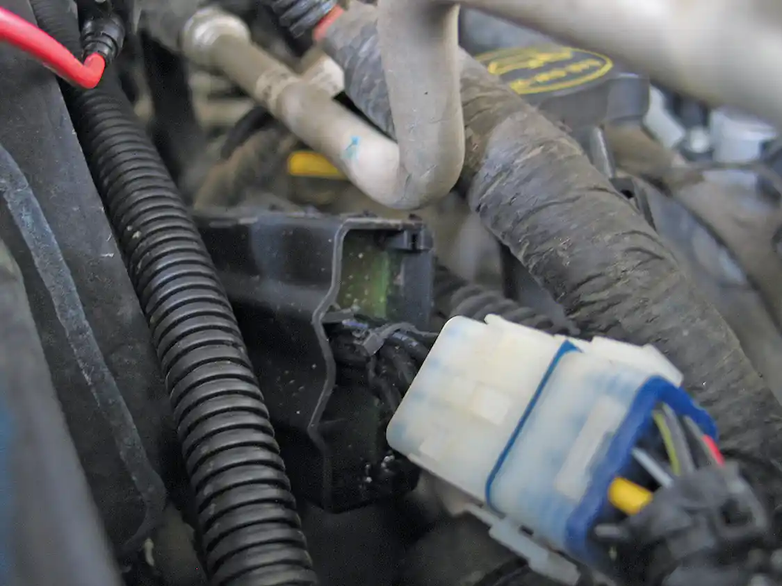 10. The controller should be mounted near the battery and secured with the supplied cable ties. When connecting the controller wiring harness, make sure the locking tabs are fully engaged.