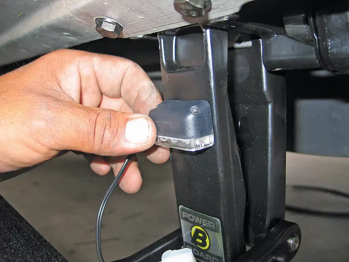 15. The LED lights are attached to each linkage arm. Our one complaint about this system is that the light housings have a concave backing, so they can only be placed on the linkage arm. We'd like to have the option of tucking them up under the body.
